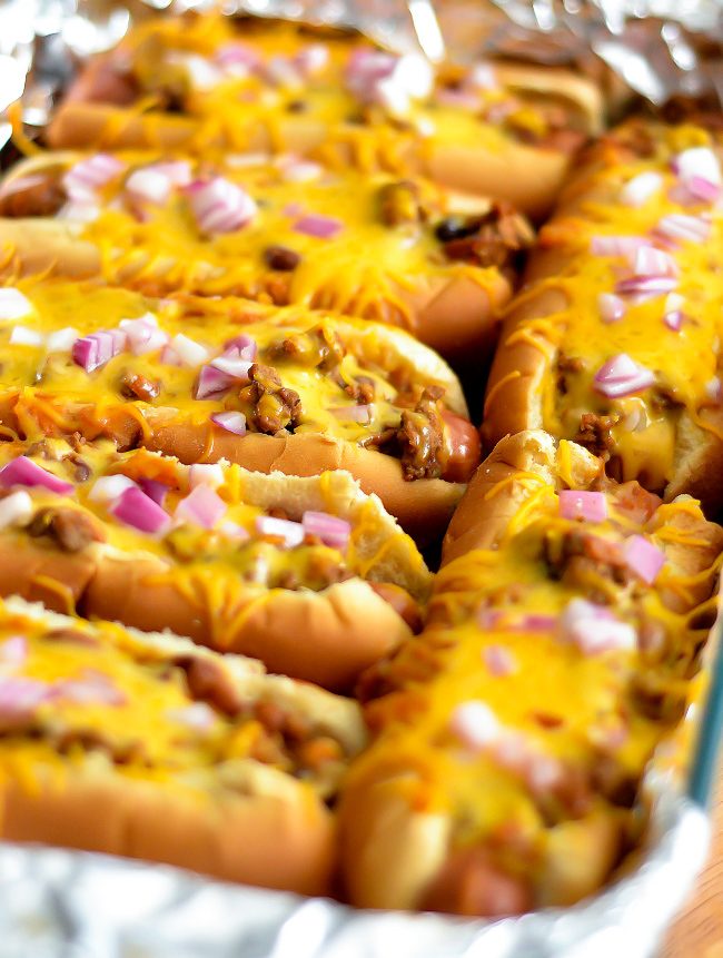 Close-up of a cheesy Baked Chili Dog with homemade chili